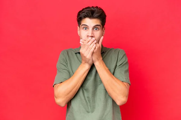 Young Caucasian Handsome Man Isolated Red Background Covering Mouth Hands — Stock Photo, Image