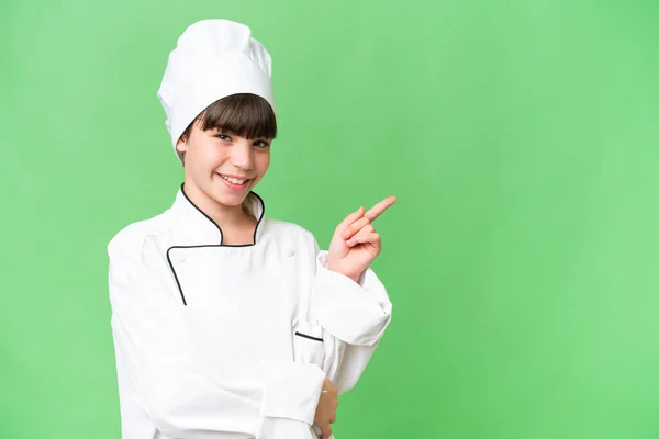 Piccola Ragazza Chef Caucasico Sfondo Isolato Puntando Dito Verso Lato — Foto Stock
