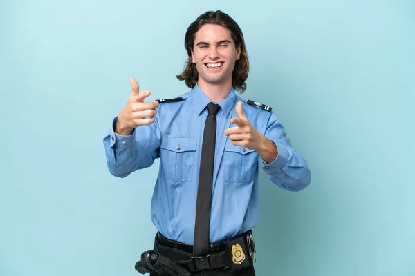 Young Police Caucasian Man Isolated Blue Background Pointing Front Smiling — Stock Photo, Image