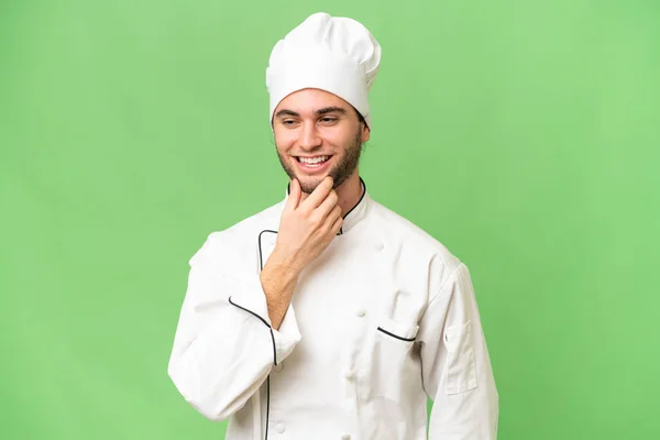 Jonge Knappe Chef Kok Man Geïsoleerde Achtergrond Kijken Naar Zijkant — Stockfoto