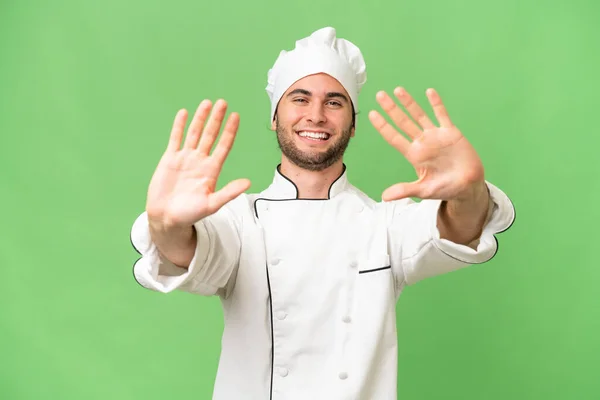 Jeune Beau Chef Homme Sur Fond Isolé Comptant Dix Avec — Photo