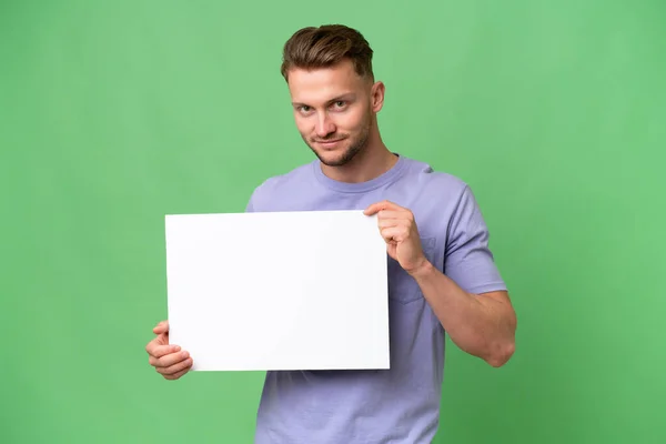 Young Blonde Caucasian Man Isolated Background Holding Empty Placard Happy — Stock Photo, Image