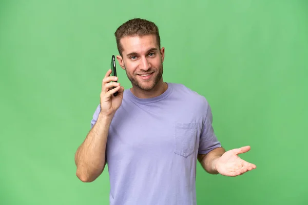 Young Handsome Caucasian Man Isolated Green Chroma Background Keeping Conversation — Stock Photo, Image