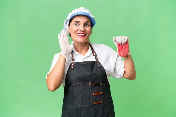 Butcher Woman Wearing Apron Serving Fresh Cut Meat Isolated Background Stock Photo