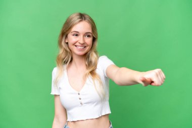 Tecrit edilmiş bir geçmişi olan genç bir İngiliz kadın baş parmak işareti yapıyor.