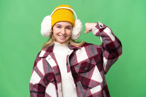 Jovem Inglesa Mulher Vestindo Inverno Muffs Sobre Isolado Fundo Fazendo — Fotografia de Stock