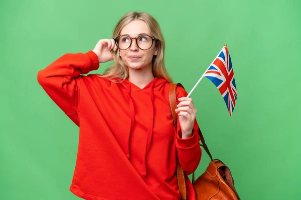 Young Hispanic Woman Holding United Kingdom Flag Isolated Background Having — стокове фото