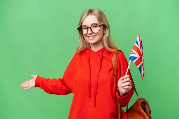 Young Hispanic Woman Holding United Kingdom Flag Isolated Background Extending — 스톡 사진