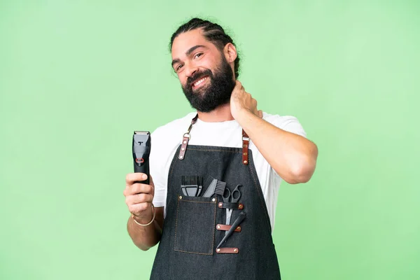 stock image Young barber man over isolated chroma key background laughing