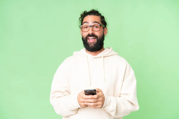 Young Man Beard Isolated Chroma Key Background Surprised Sending Message — Stok fotoğraf