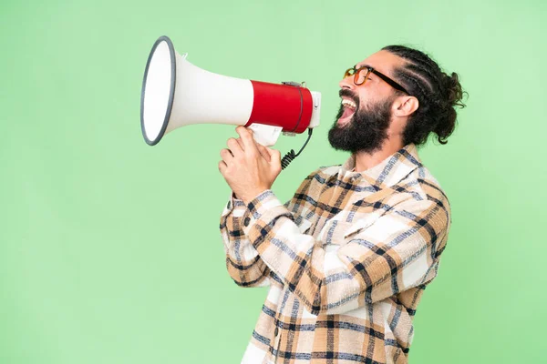 Young Man Beard Isolated Chroma Key Background Shouting Megaphone — 스톡 사진