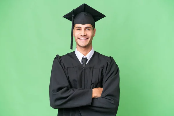 Mladý Vysokoškolský Absolvent Běloch Muž Přes Izolované Pozadí Udržující Paže — Stock fotografie