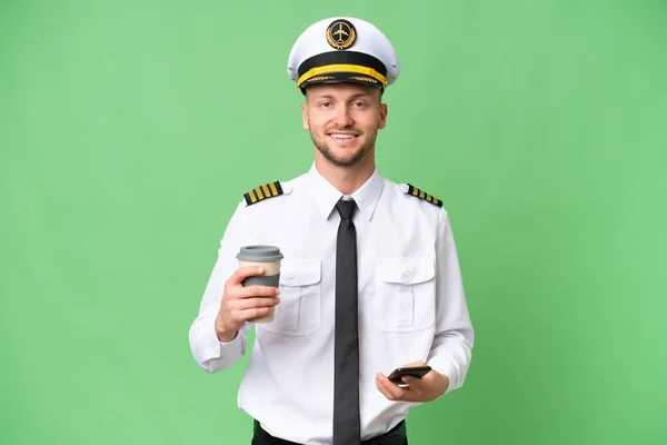 Flugzeugpilot Mann Über Isoliertem Hintergrund Mit Kaffee Zum Mitnehmen Und — Stockfoto