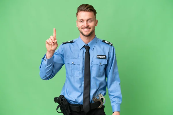 Jonge Politieman Geïsoleerde Achtergrond Tonen Heffen Van Een Vinger Teken — Stockfoto