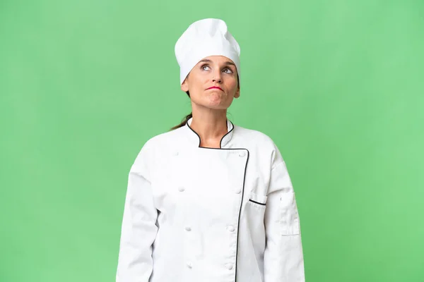 Chef Donna Mezza Età Sfondo Isolato Guardando Alto — Foto Stock
