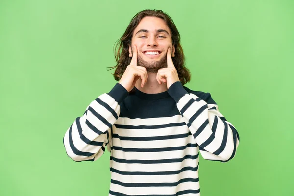 stock image Young handsome man over isolated background smiling with a happy and pleasant expression