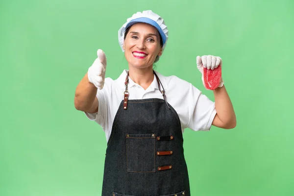 Butcher Woman Wearing Apron Serving Fresh Cut Meat Isolated Background Stock Image