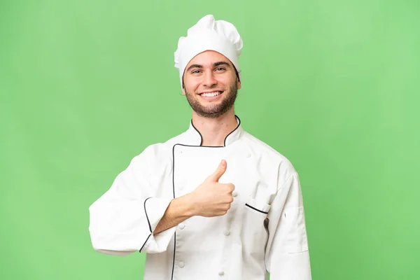 Jovem Bonito Chef Homem Sobre Isolado Fundo Dando Polegares Para — Fotografia de Stock
