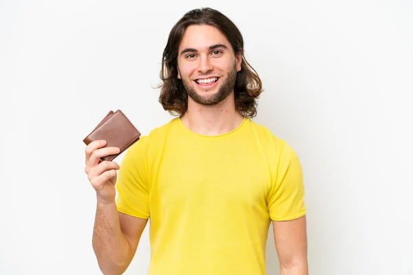 Mladý Pohledný Muž Drží Peněženku Izolované Bílém Pozadí Úsměvem Hodně — Stock fotografie