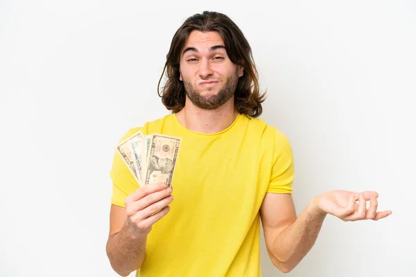 Joven Hombre Guapo Tomando Montón Dinero Aislado Sobre Fondo Blanco —  Fotos de Stock