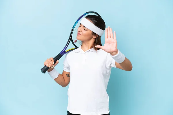 Young Tennis Player Woman Isolated Blue Background Making Stop Gesture — Stok fotoğraf