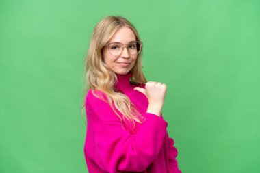 Young English woman over isolated background proud and self-satisfied