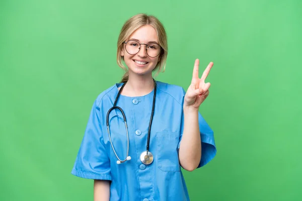 Junge Krankenschwester Englische Frau Über Isoliertem Hintergrund Lächelt Und Zeigt — Stockfoto