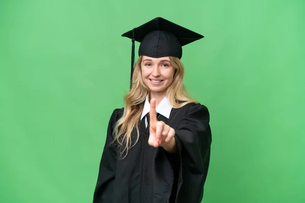 Young university English graduate woman over isolated background showing and lifting a finger