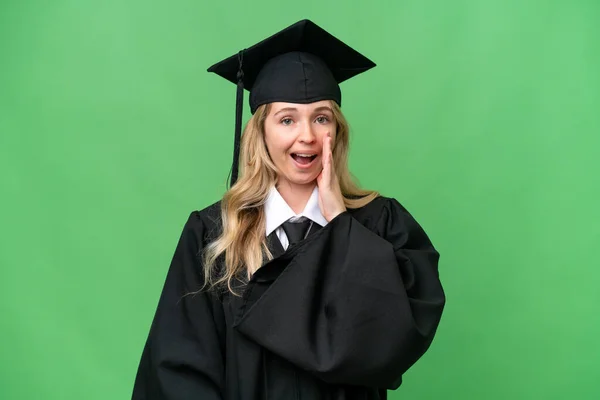 Young university English graduate woman over isolated background with surprise and shocked facial expression