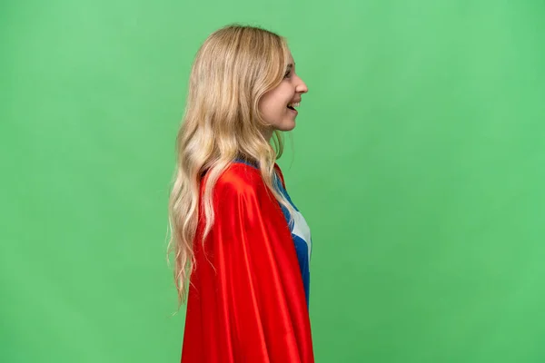Super Hero Mujer Inglesa Sobre Fondo Aislado Riendo Posición Lateral —  Fotos de Stock