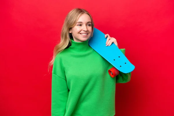 Young English Woman Isolated Red Background Skate — Stock Photo, Image