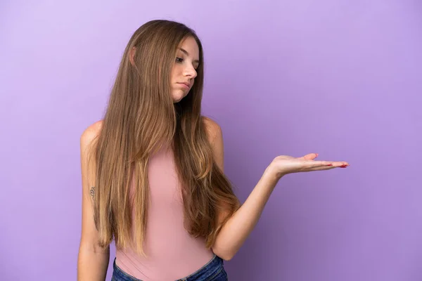 Young Lithuanian Woman Isolated Purple Background Holding Copyspace Doubts — Stock Photo, Image