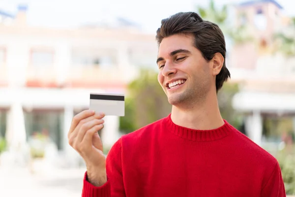 Young Handsome Man Holding Credit Card Outdoors Happy Expression — Stock Photo, Image