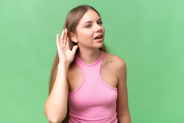 Jong Mooi Blond Vrouw Geïsoleerde Achtergrond Luisteren Naar Iets Door — Stockfoto