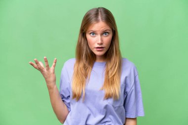 Young beautiful woman over isolated background making doubts gesture