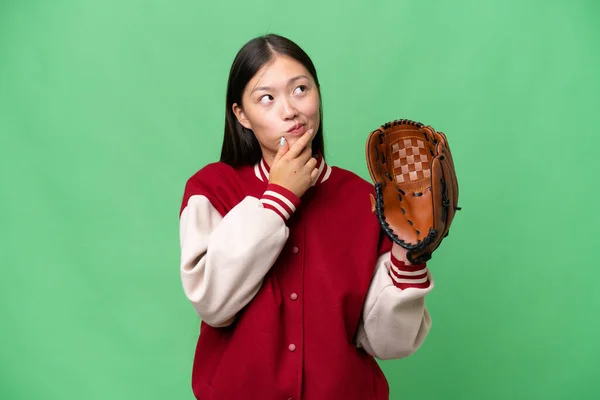 Young Asian Woman Baseball Glove Isolated Background Having Doubts — Stockfoto