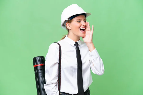 Young Architect Caucasian Woman Helmet Holding Blueprints Isolated Background Shouting — Stock Photo, Image