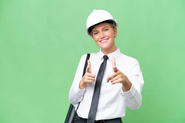 Young Architect Caucasian Woman Helmet Holding Blueprints Isolated Background Pointing — Stock Photo, Image
