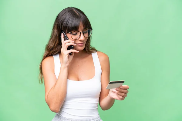 Young Caucasian Woman Isolated Background Buying Mobile Credit Card — Stockfoto