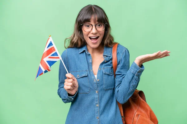 Young Caucasian Woman Holding United Kingdom Flag Isolated Background Shocked — Stock Photo, Image