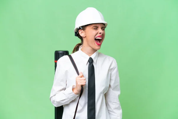 Young Architect Woman Helmet Holding Blueprints Isolated Background Laughing Lateral — Stock Photo, Image