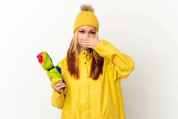 Έφηβη Ξανθιά Κοπέλα Που Φοράει Αδιάβροχο Παλτό Πάνω Από Απομονωμένο — Φωτογραφία Αρχείου