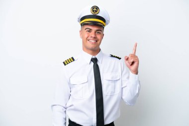 Airplane pilot caucasian man isolated on white background pointing with the index finger a great idea