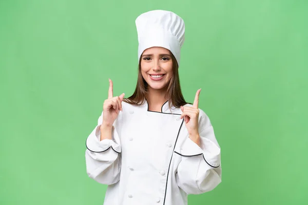 Giovane Chef Donna Caucasica Sfondo Isolato Che Indica Una Grande — Foto Stock