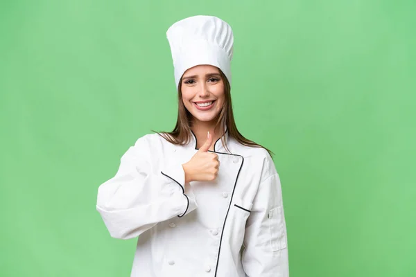 Young Chef Caucasian Woman Isolated Background Giving Thumbs Gesture — стоковое фото
