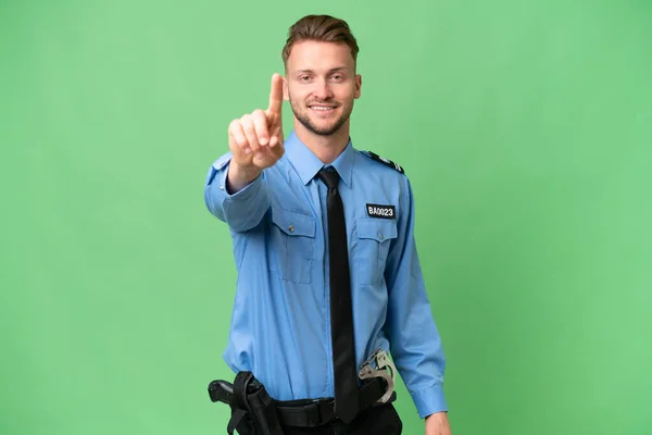 Joven Policía Sobre Fondo Aislado Mostrando Levantando Dedo —  Fotos de Stock