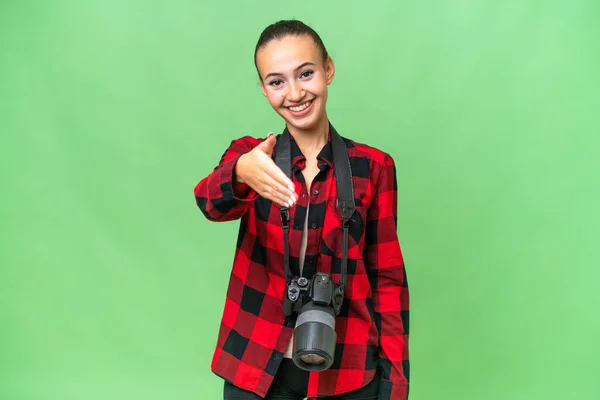 Jeune Photographe Arabe Femme Sur Fond Isolé Serrant Main Pour — Photo