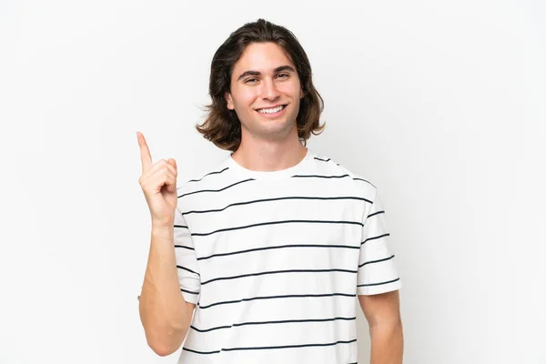 Mladý Pohledný Muž Izolovaný Bílém Pozadí Ukazující Zvedající Prst Znamení — Stock fotografie