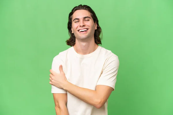 Jonge Blanke Man Geïsoleerd Groene Chroma Achtergrond Lachen — Stockfoto