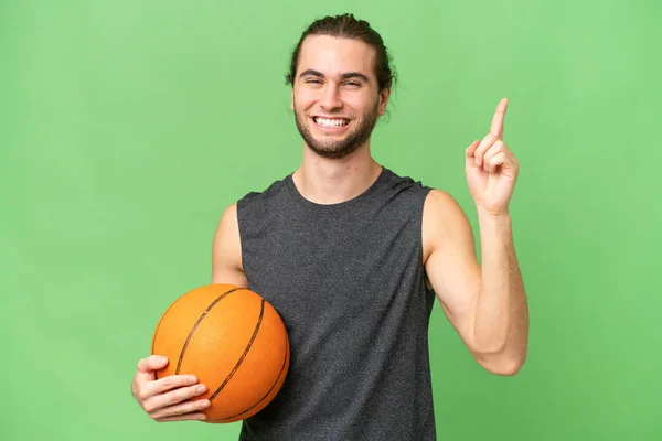Joven Jugador Baloncesto Hombre Sobre Fondo Aislado Mostrando Levantando Dedo —  Fotos de Stock